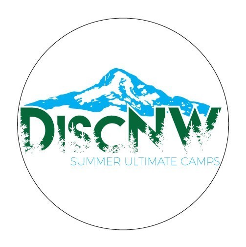 Campers gathered around a disc at summer camp